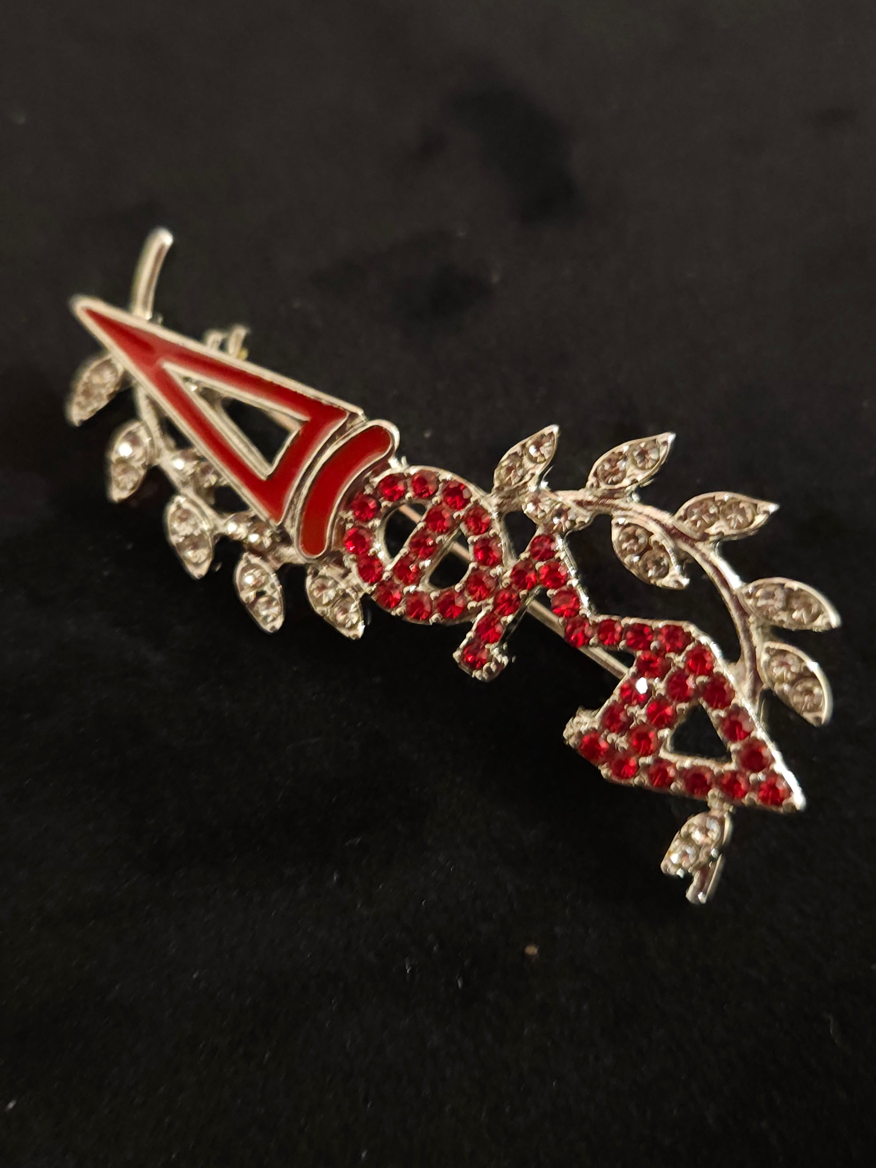 Torch of wisdom lapel pin